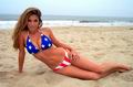 Slender model with huge rack in American flag swimsuit