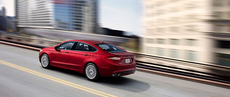 2013 Ford Fusion on the road